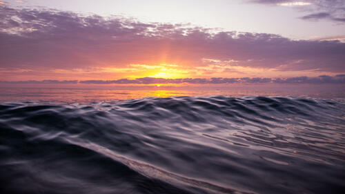 Wavy Sunrise over the sea 2